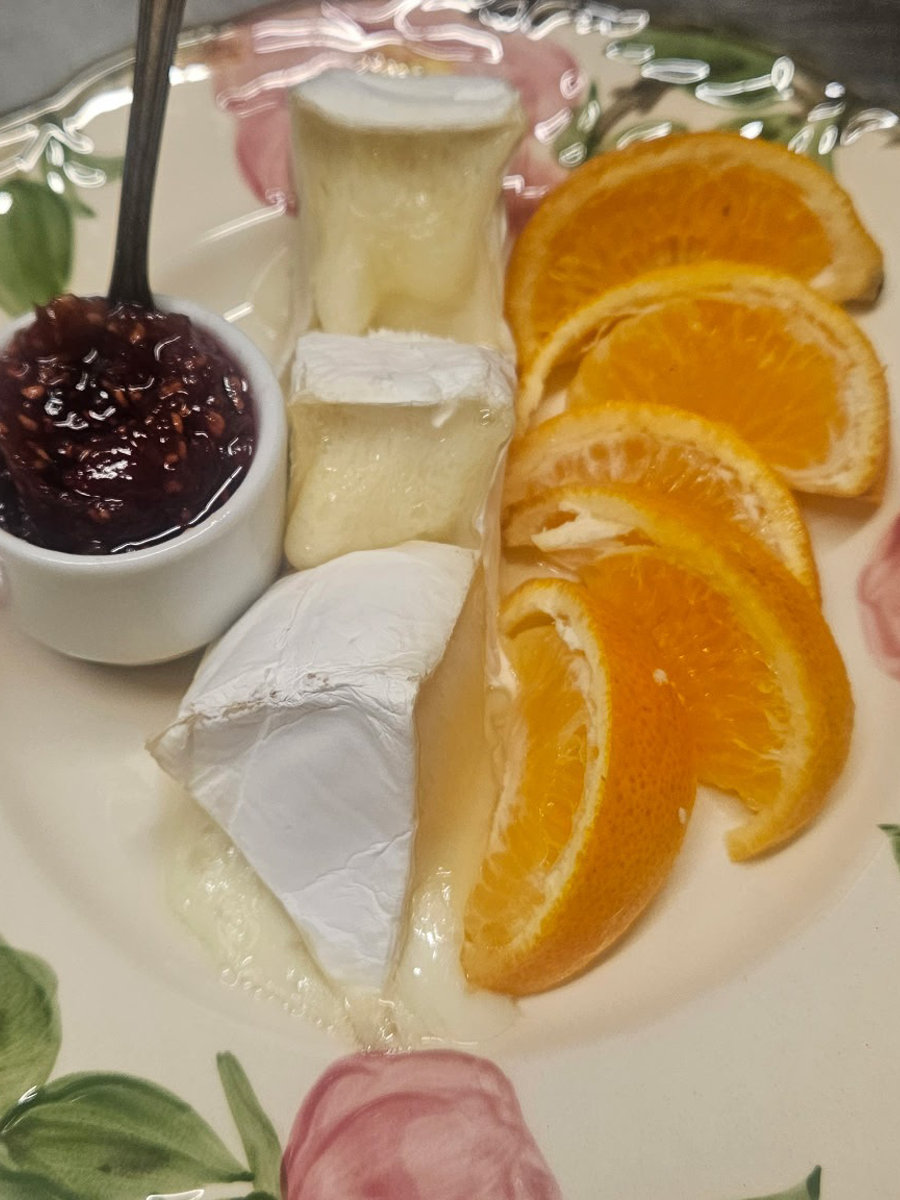Brie with fig jam and orange slices